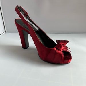 Red satin heel with bow.  Nine West